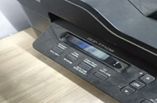 兄弟DCP-T710W打印机一开机提示墨水回收盒已满